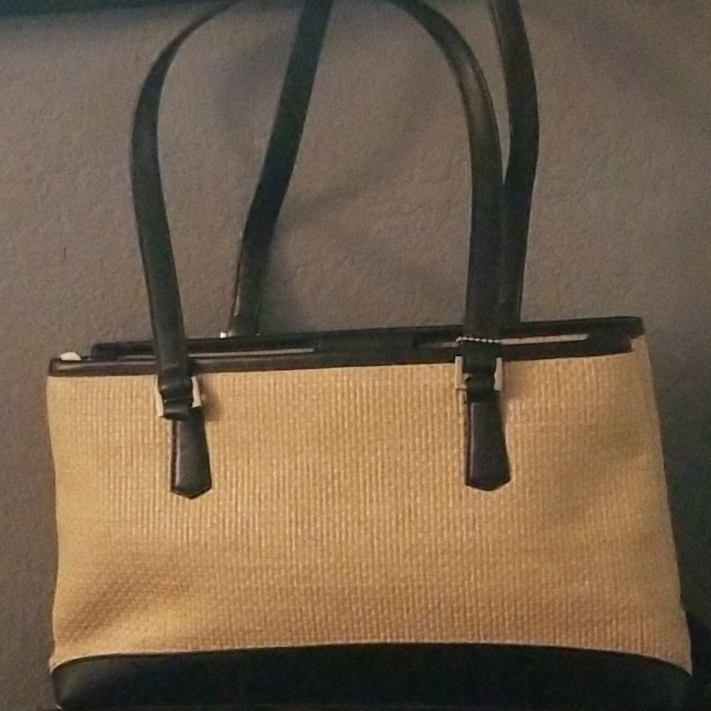 Black leather and straw bag